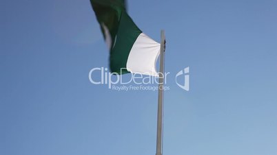 Textile flag of Pakistan on a flagpole