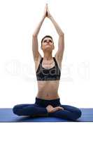 Image of yoga trainer posing in lotus position