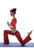 Side view of yoga instructor exercising in studio