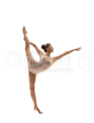 Graceful dancer performs vertical gymnastic split