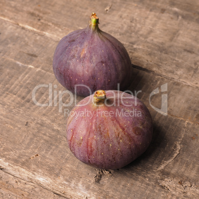 Fresh organic figs on rustic wood