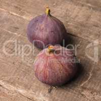 Fresh organic figs on rustic wood