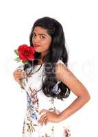 Beautiful Indian woman with rose.