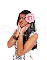 Pretty Indian woman with pink rose.