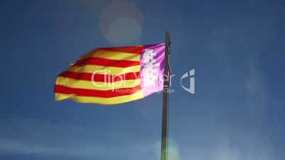 National flag of Majorca on a flagpole