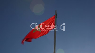 National flag of Morocco on a flagpole
