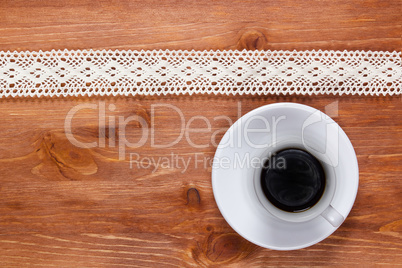 Openwork lace and cup of coffee