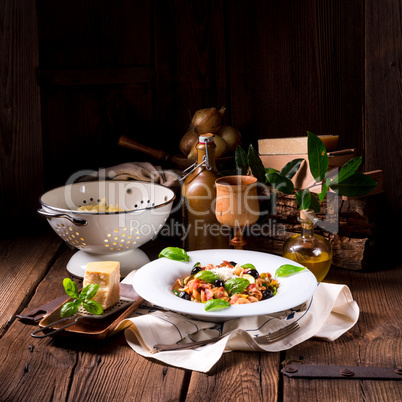 Ribbon Pasta with zucchini and olives in tomato sauce