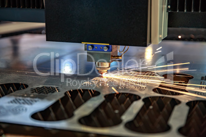 CNC Laser cutting of metal, modern industrial technology. .