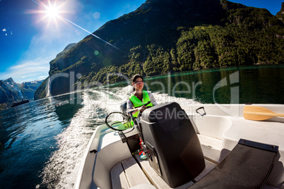 Woman driving a motor boat