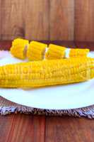 dish with boiled corns on the plate