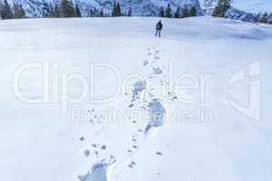 A man's footprints on the snow