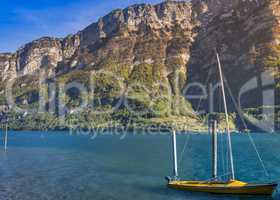 Boat with sails anchored on Walensee lake