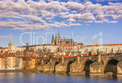 Charles Bridge under a cloudy sky