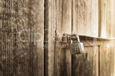 Metal lock on old barn