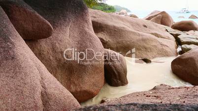 Rough waves at granites stones at Anse Lazio, Praslin island, Seychelles