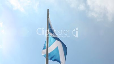 National flag of Scotland on a flagpole