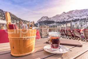 Outdoor table restaurant with cutlery and hot drink