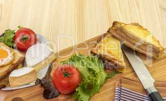 Sliced sandwich and fresh vegetables