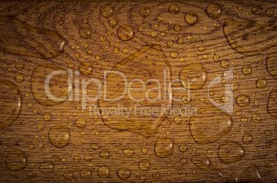 Water drops on wooden plank