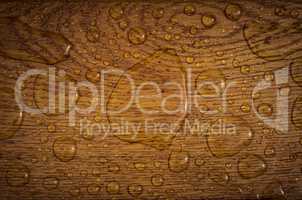 Water drops on wooden plank