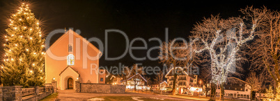 Winter night lights in an Austrian village