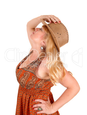 Blond woman with cowboy hat.