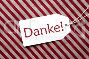 Label On Red Wrapping Paper, Danke Means Thank You