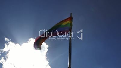 Textile rainbow flag on a flagpole