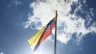 Textile flag of Colombia on a flagpole