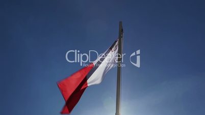 National flag of Malta on a flagpole
