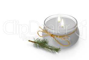 Two candles and a sprig of spruce. 3D image.