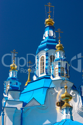 Beautiful blue and gold dome on a background of  sky