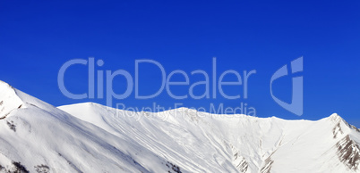 Panoramic view on snowy mountains at nice sun day Panoramic view on snowy mountains at nice sun day