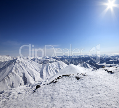 Snowy mountains at nice sun day