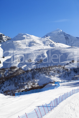Ski slope in sunny day