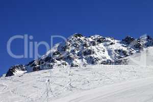 Ski slope and snow rocks