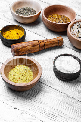 Spices in wooden bowl
