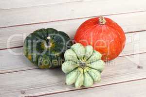 Still life with products of autumn - pumpkins