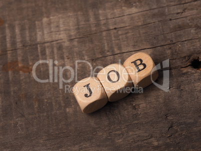 Wooden dices with the word job