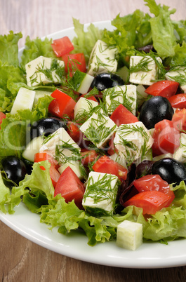 Vegetable salad with feta and olives