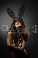 Sexual young girl posing in bunny ears mask