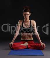 Yoga in studio. Woman doing breathing exercise