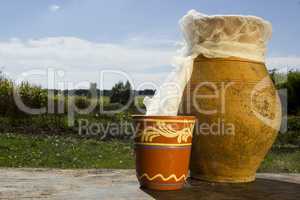 Clay jug with milk