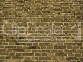 Red brick wall background sepia