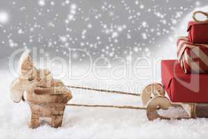 Reindeer With Sled, Silver Snowflakes Background, Copy Space