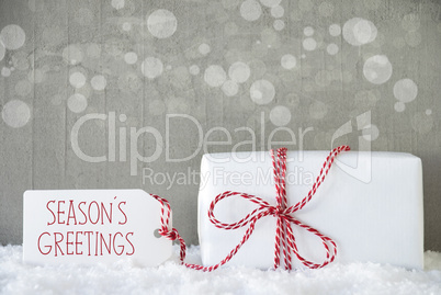 Gift, Cement Background With Bokeh, Text Seasons Greetings