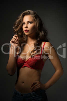 Portrait of beautiful young model dressed in bra