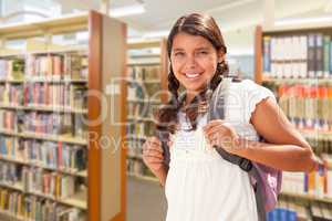 Hispanic Girl Student Walking in Library