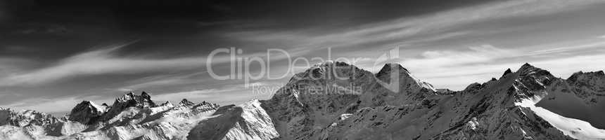 Black and white panorama of winter mountains